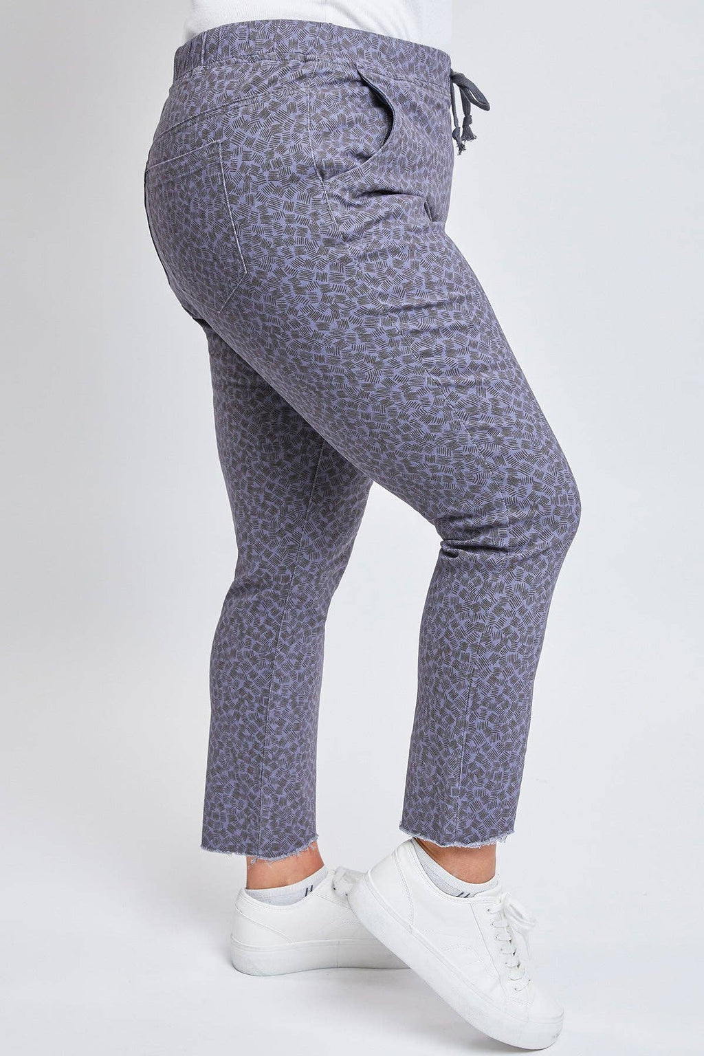 Plus Size Pull On Denim Joggers with a Whiskering Design and a Dog Bite Hem