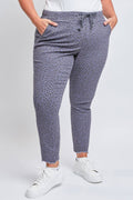 Plus Size Pull On Denim Joggers with a Whiskering Design and a Dog Bite Hem