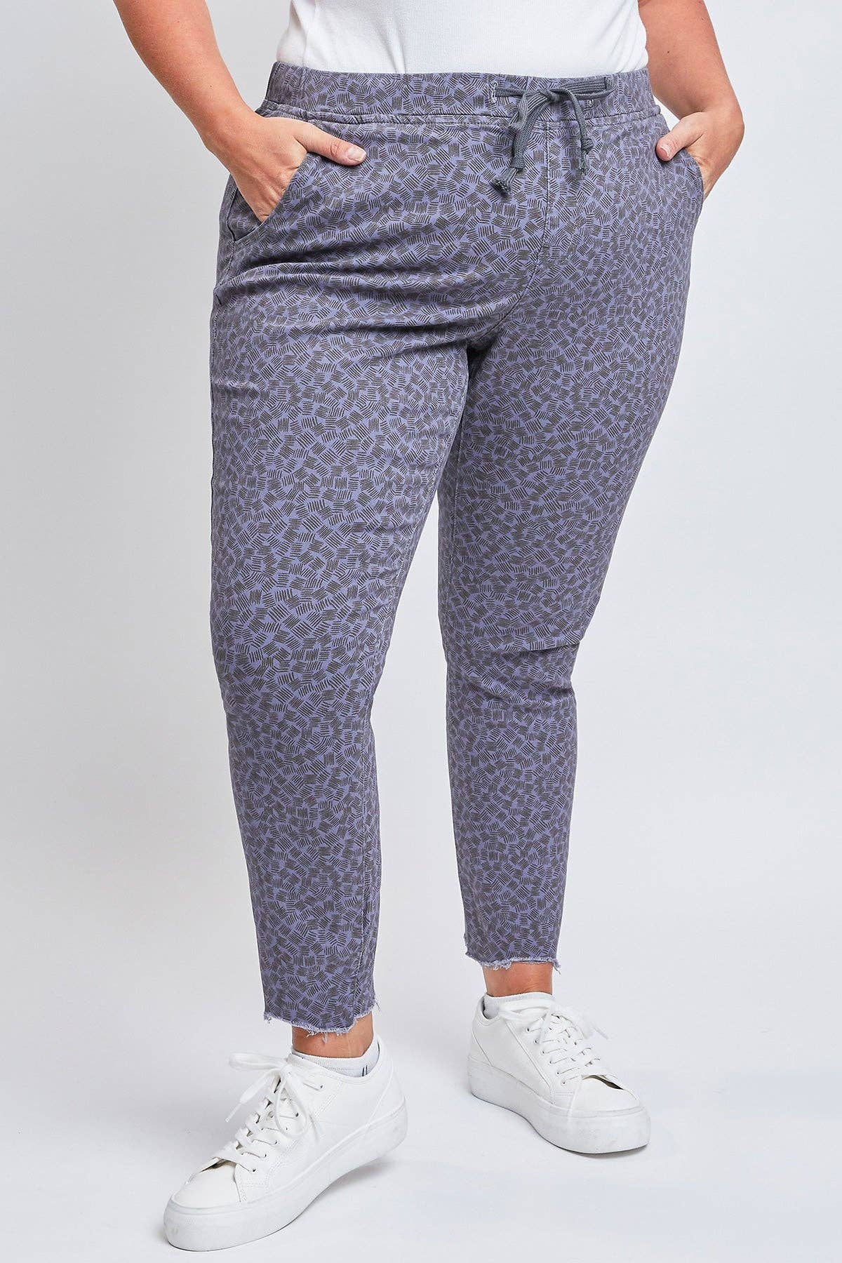 Plus Size Pull On Denim Joggers with a Whiskering Design and a Dog Bite Hem